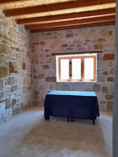 Sikia Kreta, Sikia: Drei Häuser auf einem Grundstück mit Meerblick zu verkaufen Haus kaufen